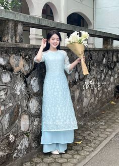 This Set includes Women : 1 Top, 1 pants Material: Vải voan tơ 🌻 The measurement of this ao dai (long dress) is in Vietnamese size (American size tends to be bigger for the same size). Please LOOK AT THE SIZE CHART CAREFULLY BEFORE ORDERING. There might have some chalk writings on the fabric due to making process. These marks can be washed away easily. 🌻🌻No returns or exchanges Buyer can contact seller about any issues with an order. 🌸 Follow us Facebook/aodaiemily www.aodaiemily.com 💜 Thank you very much!💜 Fitted Light Blue Sets For Spring, Light Blue Fitted Sets For Spring, Light Blue Floral Print Sets For Spring, Light Blue Short Sleeve Sets For Spring, Fitted Light Blue Ao Dai For Spring, Light Blue Short Sleeve Spring Sets, Fitted Blue Ao Dai For Summer, Spring Ao Dai With Floral Embroidery And Short Sleeves, Blue Ao Dai For Summer