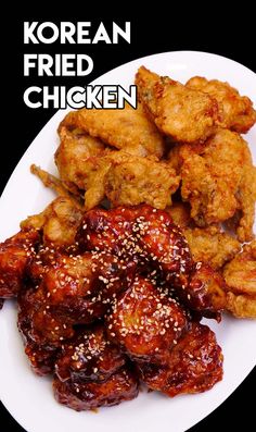 fried chicken on a white plate with sesame seeds