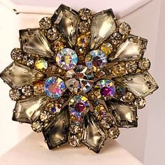 Vintage Large Brooch Rhinestones Aurora Borealis Gold Tone Setting Statement In Great Preowned Condition. Measures Approx 2 X 2 X .5 Inches. Pin0414 Party Crystal Brooches Costume Jewelry, Crystal Brooches With Sparkling Stones For Party, Party Brooches With Sparkling Crystal Stones, Party Crystal Brooches With Sparkling Stones, Multi Strand Bracelet, Black Rhinestone, Vintage Yellow, Vintage Costume Jewelry, Clear Rhinestones