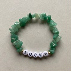 Aventurine lucky stone bracelet Bracelet length is 7 inches. Bracelet care: * Always remember to treat your bracelets gently and with care. * Don't overstretch your bracelet - stretching to put onto the hand is okay! * Remove your bracelet before sleeping and participating in vigorous physical activity. Delivery: Please note standard delivery is 2nd class. There are options for upgrades at checkout. Any customs charges that may occcur when shipping internationally are also not my responsibility. Adjustable Gemstone Beads Bracelets For Good Luck, Good Luck Adjustable Beaded Bracelets With Natural Stones, Jade Bracelets With Natural Stones For Good Luck, Good Luck Bracelets With Natural Jade Stones, Aventurine Beaded Bracelet As Gift, Adjustable Aventurine Stretch Bracelet Gift, Handmade Aventurine Crystal Bracelet Gift, Not My Responsibility, My Responsibility