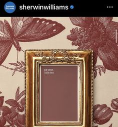 an ornate gold frame on a floral wallpaper with the words sherwin williams above it