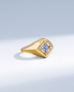 Crafted in 18-karat gold, this signet ring is set with a 4x4mm princess-cut light blue sapphire center stone and surrounded by baguette and round white diamonds. Details 18k yellow gold 4x4mm princess-cut light blue sapphire center, 0.44 carats 0.12 carats of baguette and round white diamonds 10mm width Ref: BAR1055LB Luxury Sapphire Signet Ring, Luxury Sapphire Signet Ring With Gemstone, Luxury Blue Gemstone Signet Ring, Luxury Hallmarked Sapphire Signet Ring, Luxury Yellow Gold Sapphire Signet Ring, Sapphire Signet Ring, Light Blue Sapphire, Rainbow Sapphires, Ruby Sapphire