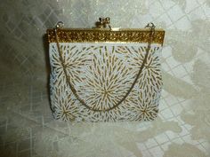 Beautiful Handbeaded Handbag Elegant White And Gold Seed Beads With Exceptional Golden Filigree Top Closure Chain Handle Wedding Accessory White Beaded Bags For Formal Occasions, Formal White Beaded Bags, White Bags With Pearl Embroidery For Celebration, Gold Evening Bag With Pearl Embroidery For Events, Gold Beaded Evening Bag For Wedding, Gold Bags With Pearl Embroidery For Events, Gold Bag With Pearl Embroidery For Event, Elegant Rectangular Bags With Gold Beads, Gold Evening Bag With Pearl Embroidery For Formal Occasions