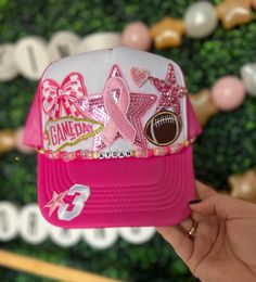 Friday Night Lights hair? Don't care!  October is Breast Cancer awareness month and lots of schools celebrate with PINK OUT games. I have TONS of pink, so let me design something special for you!  Every football mom needs one of our custom trucker hats to wear on Friday nights. I also have different colored footballs, baseballs, soccer balls, hockey sticks, volleyballs and basketballs!   All our hats are totally customizable, so message us to request custom colors or patches. We can build a custom listing just for you! Pink Out Football, High School Spirit, Fund Raiser, Custom Trucker Hats, Friday Nights, Hockey Sticks, Pink Out, Hat Ideas, Friday Night Lights