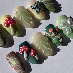 enchanted forest custom set 🍄🌳✨ vine nail ib @setsxnenita mushrooms ib @innerbloom.nails . . . #pressonnails #pressonnailbusiness #nailart #naildesign #3dnailart #handpaintednailart #enchantedforest #forestnails #naturenails #mushroomnails #butterflynails Mushroom Press On Nails, Pretty Press On Nails, Short Mushroom Nails, Enchanted Nails Design, Mossy Nails, Forest Nails Designs, Forest Fairy Nails, Aesthetic Nails Spring, Trippy Mushroom Nails