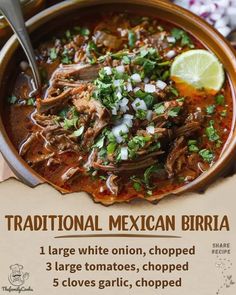 a bowl filled with meat, onions and cilantro on top of a table