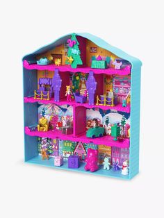 a toy doll house with lots of furniture