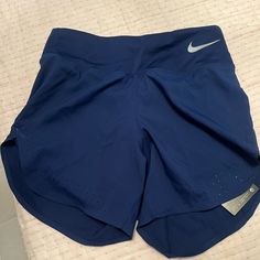 Womens Xs High Waisted Navy Shorts. Never Worn. New With Tags Nike Blue Activewear With Built-in Shorts, Nike Blue Short Leg Activewear, Nike Workout Bottoms In Blue, Nike Blue Workout Bottoms, Nike Running Shorts, Navy Shorts, Nike Shorts, Nike Running, Shorts Athletic