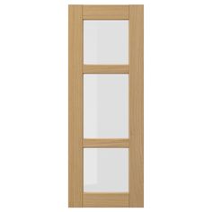 a wooden door with three glass panels