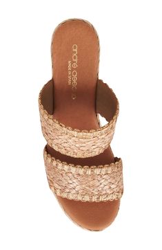 Woven raffia creates a boho aesthetic on an espadrille-inspired slide sandal lofted by a subtle platform and wedge heel. 3" heel; 1/2" platform Cushioned footbed Textile upper/leather lining and sole Made in Spain Espadrilles Platform, Boho Aesthetic, Woven Raffia, Platform Wedge, Sandal Women, Platform Wedges, Slide Sandals, Wedge Heels, Cocoa