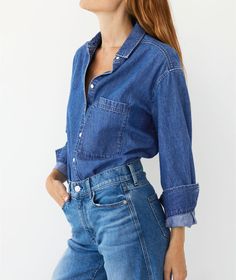 This lightweight denim shirt is a world-renowned concert pianist who's made waves in the classical music scene for (among many other things) her sartorial commitment to the Texas Tuxedo instead of the traditional black wool penguin suit. She's regarded among those who follow her iconic, bestselling button down sisters--The Deep Ends in Oxford and ﻿Cotton Poplin)--as the sister with *the best* interior design taste. She's won awards for her flower arranging skills and, rumor has it, will sketch t Classic Indigo Shirt For Work, Indigo Shirt For Workwear In Fall, Classic Dark Wash Shirt For Spring, Classic Washed Blue Shirt For Workwear, Classic Medium Wash Shirt For Work, Classic Dark Wash Tops With Pockets, Classic Indigo Tops For Workwear, Classic Fitted Medium Wash Shirt, Classic Fitted Shirt In Medium Wash