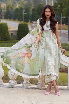 Alluring Mint Green Shade Embroidered Pakistani Salwar Kameez is crafted with exquisite precision, this ensemble boasts delicate embroidery adorning both the front and back panels, adding a touch of timeless elegance to your look. The intricately embroidered neckline on both the front and back further elevates the ensemble, exuding sophistication and charm. Embroidered Kameez: The perfectly crafted kameez is adorned with intricate embroidery on the front, and sleeves making the elegant design. The neckline and sleeves are alluring with embroidered patch details making this outfit a timeless choice for your festivities. Salwar Suit: The heavily embroidered kameez is paired with pants to create a lavish Pakistani Party Dress. This salwar kameez suit comes in raw silk fabric and its borders a Latest Designer Dresses, Pakistani Salwar, Pakistani Party Wear, Raw Silk Fabric, Pakistani Salwar Kameez, Embroidered Sleeves, Delicate Embroidery, Pure Chiffon, Embroidered Neckline