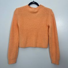 Nwt Zara Crew Neck Knit Sweater Peach Size Medium Orange Knitted Top For Fall, Orange Textured Knit Top For Fall, Casual Orange Knit Sweater, Orange Long Sleeve Stretch Sweater, Orange Stretch Long Sleeve Sweater, Spring Turtleneck Knit Cropped Sweater, Cozy Orange Knit Top, Orange Ribbed Winter Sweater, Orange Knitted Long Sleeve Tops