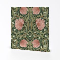 an intricately designed wallpaper with pink flowers and leaves