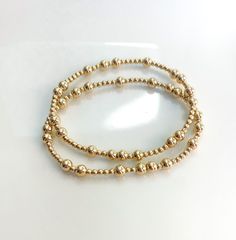 14k Gold Filled Scattered Beaded Bracelet - Etsy 14k Gold-filled Yellow Gold Beaded Bracelets, Gold Beaded Bracelet With Tiny 14k Gold Filled Beads, Gold 14k Gold-filled Tiny Beaded Bracelets, Gold 14k Gold-filled Round Beads Bracelets, Gold Bracelet With Spacer Beads In 14k Gold Filled, Gold Rosary Bracelet With Tiny Beads Gift, Hand-strung 14k Gold-filled Bracelets, Gold Beaded Bracelets With 14k Gold-filled Round Beads, Gold Beaded Bracelets With 14k Gold Filled Round Beads