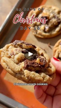 a person holding a chocolate chip cookie in their hand with the words 25 days of christmas day 16