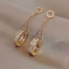 Stunning New Dainty 18kgp Sim Diamond Round Slider Drop Dangle Earrings Engraved W/Roman Numerals Around The Outside That Hang From A Delicate Gold Chain Connected To Tiny Gold Hoop Studs. So Beautiful, Feminine & Lux! Perfect For Any Outfit Or Occasion! For Your Comfort These Come W/2sets Of Earring Backs. - Size: 2.25in L X .50in W, Top Hoop Stud Is Not Quite 1/4in Round. ** Brand New W/Tag! **Msrp $116 ** See Jewelry Sale Ads At Or Near Top Of Closet For Savings Info! All Jewelry On Sale! ** Elegant Gold Chain Dangle Jewelry, Elegant Dangle Gold Chain Jewelry, Elegant Gold-plated Earrings With Gold Chain, Gold Plated Yellow Gold Chain Earrings, Yellow Gold Plated Chain Earrings, Elegant Gold Chain Earrings, Elegant Round Pendant Earrings In Metal, Elegant Metal Earrings With Round Pendant, Gold Chain Earrings For Gift