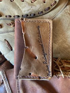 Fantastic card wallet made from repurposed, vintage baseball glove leather and premium soft textured steer hide. Sewn with polyester thread. Handcrafted in Wyoming. Each wallet has pieces cut from actual baseball gloves making each one unique and one of a kind. Perfect for baseball lovers! Baseball Glove Wallet, Vintage Baseball Gloves, Baseball Gloves, Matching Patterns, Leather Card Wallet, Tan Cowhide, Repurposed Vintage, Baseball Glove, Vintage Baseball