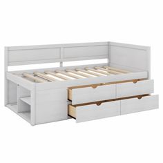 a bed with two drawers underneath it and an open drawer under the bed frame is white