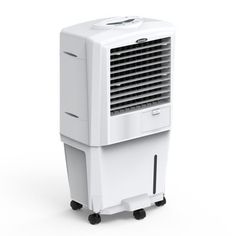 an air cooler sitting on top of a white table