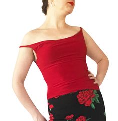 "Classic, all-around cami showcases your fabulous skirts and pants. Draped front and back necklines. Partially lined bodice. 5\" spaghetti straps work with most bras. Item #TL202. Soft, silky and stretchy poly/spandex jersey. Size: -Sizes 4 through 16 Fabric & Care: -Easy care, no-wrinkle poly/spandex -Hand wash cold. Hang dry. Overview: -Great for travel - rolls up small. -Handmade in our studio in Santa Fe, New Mexico USA. Questions about fabric, fit or size? Email me. I am delighted to he Chic Tops With Built-in Bra And Fitted Bodice, Fitted Cami Tank Top With Built-in Bra, Fitted Camisole With Built-in Bra For Evening, Elastane Camisole With Built-in Bra For Night Out, Fitted Strapless Camisole For Spring, Strapless Fitted Camisole For Spring, Fitted Camisole With Built-in Bra, Chic Fitted Strapless Camisole, Red Fitted Halter Top With Built-in Bra