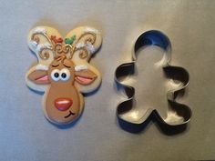 two cookie cutters shaped like animals on a table