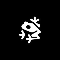 a white frog on a black background with an arrow in the middle and one eye open