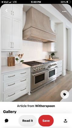 a kitchen with white cabinets and stainless steel stove top oven, which is on instagram