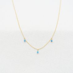 "Turquoise Necklace made with Yellow Gold Filled 14K | 3 Turquoises Charms | Dainty choker Turquoise Necklace | Genuine Turquoise ------------------👑DESCRIPTION------------------  Type : Necklace   Made of : Yellow gold filled  Very Tiny Chain (1mm) This is So delicate and feminine it is perfect for Layered Jewelry  Precious Stone : High Quality Blue Turquoise 2mm  Length Min : 18  Length Max: 18 (choose yours)  Handmade in Paris Note that it is a delicate and very cute Jewelry the Width of the Turquoise Teardrop Necklace For Jewelry Making, Dainty Blue Turquoise Pendant Necklace, Turquoise Gemstone Dangle Necklaces, Turquoise Dangle Necklaces For Gifts, Turquoise Dangle Jewelry Birthstone, Turquoise Dangle Birthstone Jewelry, Dainty Turquoise Teardrop Jewelry, Turquoise Birthstone Dangle Jewelry, Turquoise Charm Necklaces For Jewelry Making