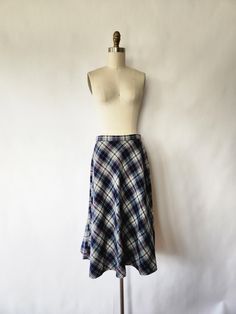 This vintage 1970s wool skirt is the epitome of vintage acedemia style! It features a plaid print skirt with with soft pleats, a waistband and a hidden metal zipper closure. ✂------ M E A S U R E M E N T S ------- best fit: small Skirt Waist - 28 inches  Hips - 44 inches Length - 28 1/2 inches tag/label - brand marker: JRS material: acrylic, polyester, wool and metal zipper condition: Excellent vintage condition. Cleaned and ready to wear. (Dry clean only) ★ Free Shipping - Processing, packaging, and tracking are included for most U.S. orders and there may be an additional cost for international orders. ★ Express shipping is available for U.S. & and international orders for an additional cost! ★ Visit our shop at: https://www.etsy.com/shop/VivianVintage8 ★ View more skirts at: https://vivi Vintage Plaid Full Skirt, Vintage Plaid Pleated Skirt, Vintage Plaid Pleated Skirt For Fall, Vintage Pleated Plaid Skirt, Plaid Print Skirt, Preppy Skirt, Label Marker, Collegiate Style, Skirt Medium