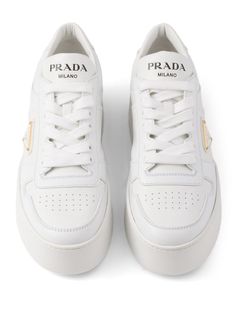 Find PRADA Downtown Bold Leather Sneakers on Editorialist. white leather smooth grain panelled design triangle logo logo-print tongue round toe front lace-up fastening perforated toebox branded heel counter branded leather insole platform sole White Low-top Platform Sneakers With Logo Detail, Leather Platform Sneakers With Logo Detail And Round Toe, White Leather Platform Sneakers With Logo, Sporty Calf Leather Sneakers With Logo, Luxury Lace-up Sneakers With Logo Detail, Luxury Logo Sneakers For Sports, Luxury Low-top Platform Sneakers With Logo, White Calf Leather Sneakers With Embossed Logo, Modern White Custom Sneakers With Perforations