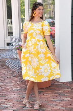 This open back midi is just precious! The floral yellow print just screams summer and is perfect for styling sneakers, wedges, or sandals! Dress is lined and has pockets. 100% COTTON BUST LENGTH XSMALL 30" 41.5" SMALL 32" 42" MEDIUM 34" 42.5" LARGE 36" 43" Styling Sneakers, Purse Scarf, Sunflower Fields, Yellow Print, Dress Accessories, Sweater Jacket, Bottoms Pants, Open Back, Dress Skirt