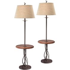 two lamps with wooden bases and shades on them