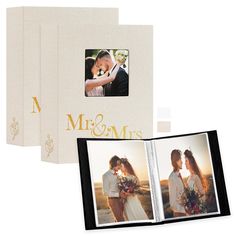 an open photo album with two photos and the words mr & mrs printed on it