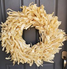 a close up of a wreath on a door