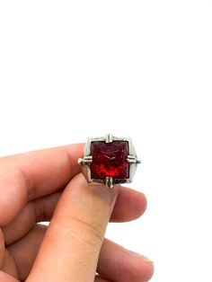 "Vintage Artisan Brutalist Sterling Silver Red Glass Sugarloaf Ring Size 6.75 Up for offer is a unique and stunning vintage artisan made brutalist solid sterling silver and rub red art glass carved sugar loaf paste rhinestone ring. Ring is marked \"925\". Measurements Ring Size: 6.75 Sugarloaf: 13mm x 13mm x 10m Band Width: 5mm Weight: 10.3 g Condition: Excellent; item is pre-owned and may have some signs of light use. Please inspect pictures for overall condition. This item comes from a clean, Sugarloaf Ring, Sterling Ruby, Sterling Silver Bangle Bracelets, Rhinestone Ring, Red Art, Red Band, Silver Bangle Bracelets, Sterling Silver Bangles, Heart Locket