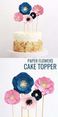 the cake is decorated with paper flowers on top