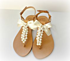 Wedding sandals- Greek leather sandals decorated with white pearls and satin bow -Bridal party shoes- Ivory women flats- Bridesmaid sandals by dadahandmade on Etsy Bridal Sandals Flat, White Bridal Sandals, Bridesmaid Flats, Bridesmaid Sandals, Bridal Party Shoes, Flat Sandals Wedding, Ivory Sandals, Sandals Greek, Beach Wedding Shoes