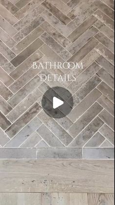 a bathroom with gray and white tile on the floor, and an arrow pointing up to the