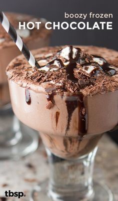 two glasses filled with ice cream and chocolate