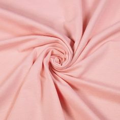 a close up view of a pink fabric