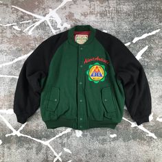 "This is used item , please don't expected it to be like \"new\" or in \"pristine\" condition, Thank You. MEASUREMENT Pit to pit : 25 inches Length : 25 inches Shoulder : 27 inches Sleeve : 18 inches Condition : 8/10 (recommemded to size M or L)" Vintage Hooded Track Jacket For Fall, Retro Long Sleeve Varsity Jacket For Outdoor, Retro Varsity Jacket For Outdoor, Vintage Long Sleeve Track Jacket For Winter, Vintage Winter Sport Coat For College, Vintage Green Long Sleeve Sport Coat, Vintage Green Varsity Jacket For College, Vintage Fall Windbreaker For Streetwear, Green Vintage Varsity Jacket For College