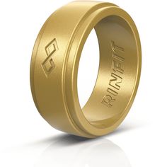 a gold wedding ring with the word love written in black lettering on it, against a white background