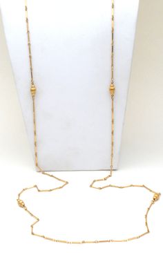 Fashion Jewelry - This is a 54" long gold tone segmented link & bead necklace. It has a hanging Monet tag, has spring ring clasp and long enough to wear double or triple. Elegant Gold Long Necklace With Gold Beads, Formal Gold Chain Necklace With Beads, Gold-tone Long Necklace For Formal Occasions, Long Beaded Chain Necklace In Yellow Gold, Gold Long Beaded Necklace, Yellow Gold Long Beaded Chain Necklace, Formal Long Gold Chain Necklace, Gold Double Strand Chain Necklace With Beads, Gold Beaded Long Chain Necklace