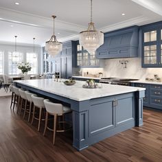 a large kitchen with blue cabinets and white counter tops, an island in the middle