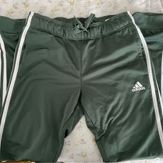 Cute Sage Green Adidas Track Pants/Joggers, Women’s Size Small. Perfect Condition, Never Worn! Green Casual Bottoms For Sports Events, Casual Green Bottoms For Sports Events, Adidas White Joggers For Jogging, Casual Green Bottoms With Three Stripes, White Adidas Joggers For Jogging, Sporty Green Cargo Pants, White Adidas Jogging Pants, Casual Green Adidas Bottoms, Sporty Green Bottoms For Sports Events