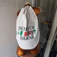 Vintage 1990's United Comors Of Benetton Hawaii Large Logo Beachbag Unisex Backpack Large Size. Features Italian Flag Alongside The Hawaiian Flag And A Palm Tree Beside Them. These Were Exclusively Available Only From The Benetton Store Here In Waikiki In The 90s, It Was Procured In Here Hawaii And Will Be Shipped From To You From Honolulu. White Polyurethane Material. New In Original Bag Without Tag, I Unsealed It In Order To Photograph It. 4-0226 Questions? Leave A Comment Below! White Cotton Backpack For Travel, White Cotton Travel Backpack, Casual White Tote Backpack, Casual Beach Backpack, White Backpack For Beach, Casual Tote Backpack For Vacation, Casual Backpack Tote For Vacation, Casual Beach Tote Backpack, White Cotton Standard Backpack