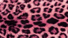 an animal print pattern is shown in pink and black colors, as well as dark spots