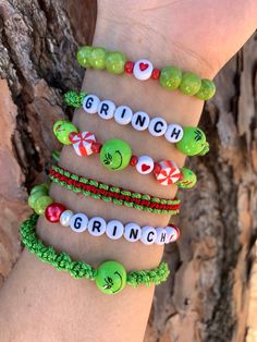 Beautiful Pink Grinch bracelets 😍🥰 Red and Green Grinch Bracelets   https://roxysshop2021.etsy.com/listing/964464884 Pink and. Green Bracelets   https://roxysshop2021.etsy.com/listing/1613403824 Size: 🎄Adult: 6-6.5' (about 10-10.5 inches when fully open)  🎄Kid: 5-5.5' (about 7-7.5 inches when fully open)  Materials: nylon #18, #2, dyed jade beads, black glass pearls, seed beads, acrylic resin Grinch beads, red glass beads, glass green beads, mini jingle bells and 18k gold plated beads. Message me with any questions or different sizing prior to purchase 💕.  Remember that handmade pieces are always unique and they never look exactly the same 🤩 that's why they are so special 😍😉. ️🎁 Follow  me on Instagram  and Facebook for giveaways, special offers and discounts   @roxysshop2021 Christmas Stretch Bracelets, Adjustable Bracelets For Christmas Holiday, Festive Adjustable Personalized Bracelets, Green Beaded Bracelets For Holiday Gifts, Adjustable Green Beaded Bracelets For Christmas, Handmade Adjustable Christmas Bracelets, Adjustable Bracelet For Christmas Gift, Adjustable Beaded Bracelet Christmas Gift, Adjustable Beaded Bracelets For Christmas Gift