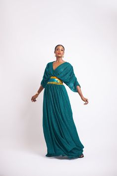 Timelessly elegant, this cheetah gold streaks chiffon maxi dress pairs a gracefully pleated batik waistline with soft draped sleeves and flowy bottom. A daring decolletage neckline completes the look. Green Maxi Dress With Draped Sleeves, Gala Maxi Dress With Draped Sleeves, Flowy Floor-length Evening Kaftan, Floor-length Flowy Evening Kaftan, Flowy Maxi Dress With Draped Sleeves, Evening Floor-length Flowy Kaftan, Chiffon Maxi Dress With Draped Sleeves, Silk Flowy Floor-length Maxi Dress, Flowy Floor-length Maxi Dress With Draped Sleeves